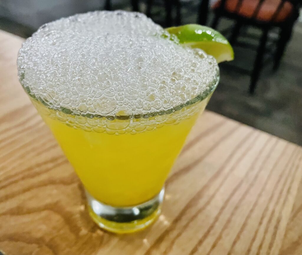 The aptly named Seafoam Margarita with tangy mandarin and briny salt air foam. (Photo by Courtney Dabney)