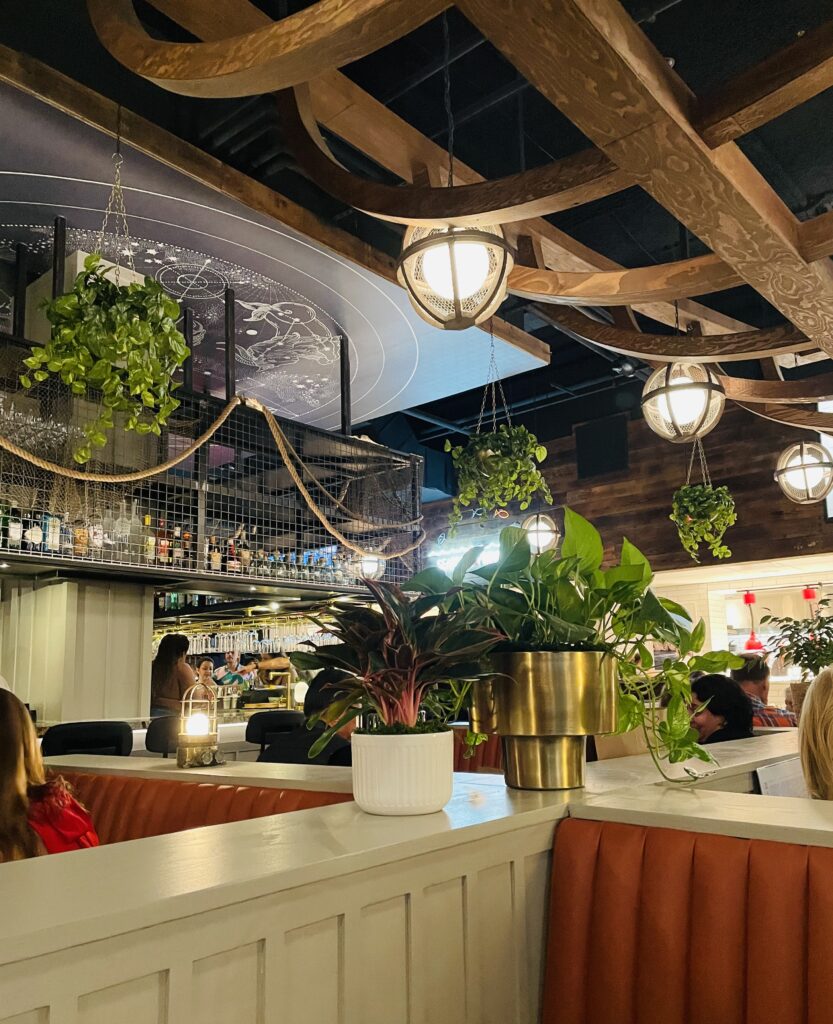 The fresh nautical interior reinforces the seaside theme at Plank Fort Worth. (Photo by Courtney Dabney)