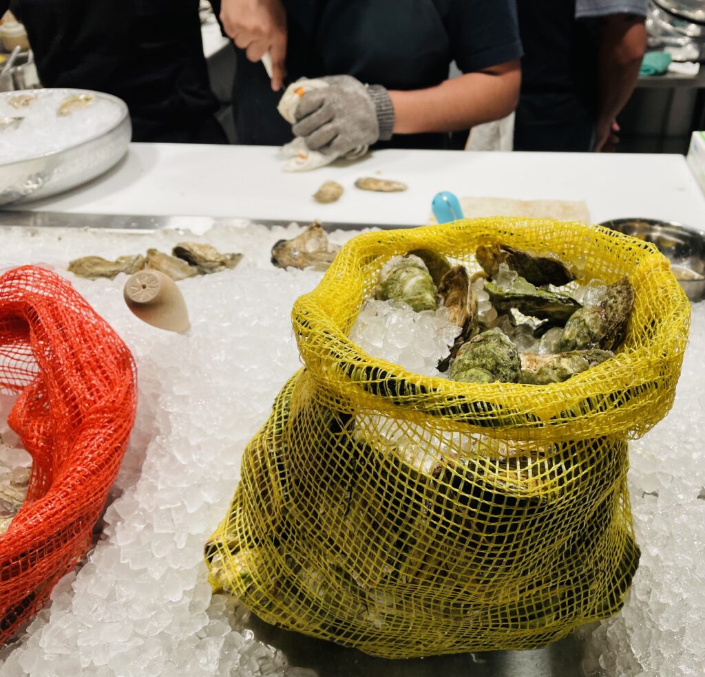 The raw bar was rocking at the soft opening of Plank Seafood Provisions in Clearfork. (Photo by Courtney Dabney)