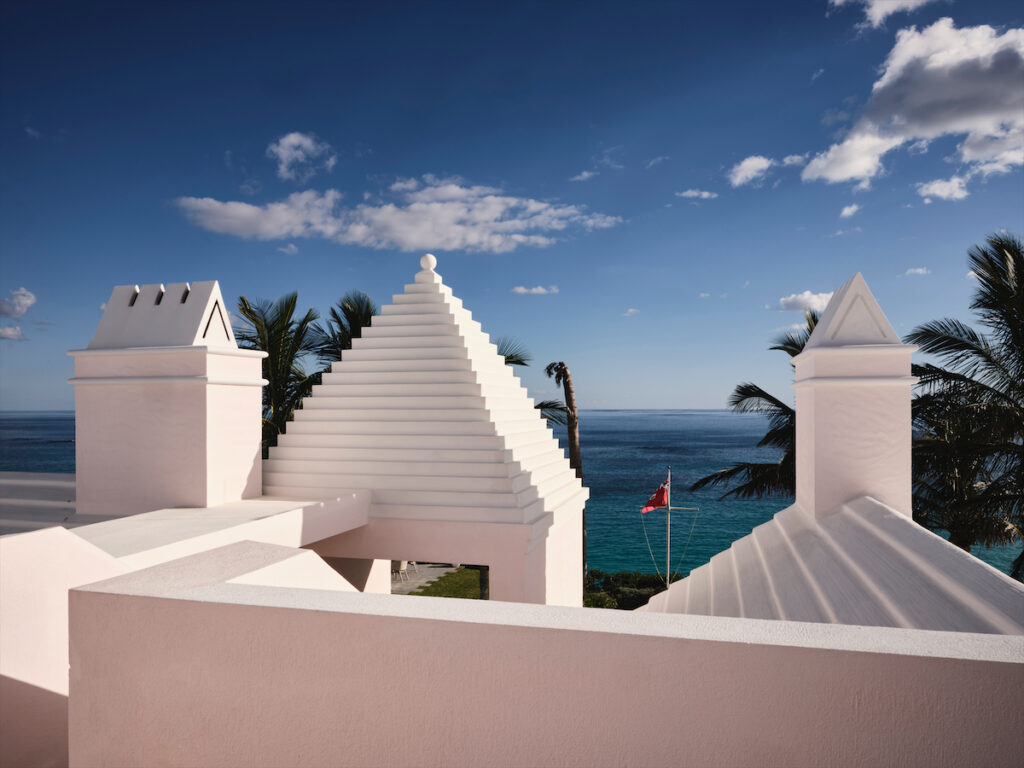 Located on a rocky promontory overlooking the ocean, the house’s architecture features the Bahamian island’s signature peaked, stepped rooftops, as well as a centrally located buttery, a room designed to house provisions brought by trade ships. (Photo by Douglas Friedman)