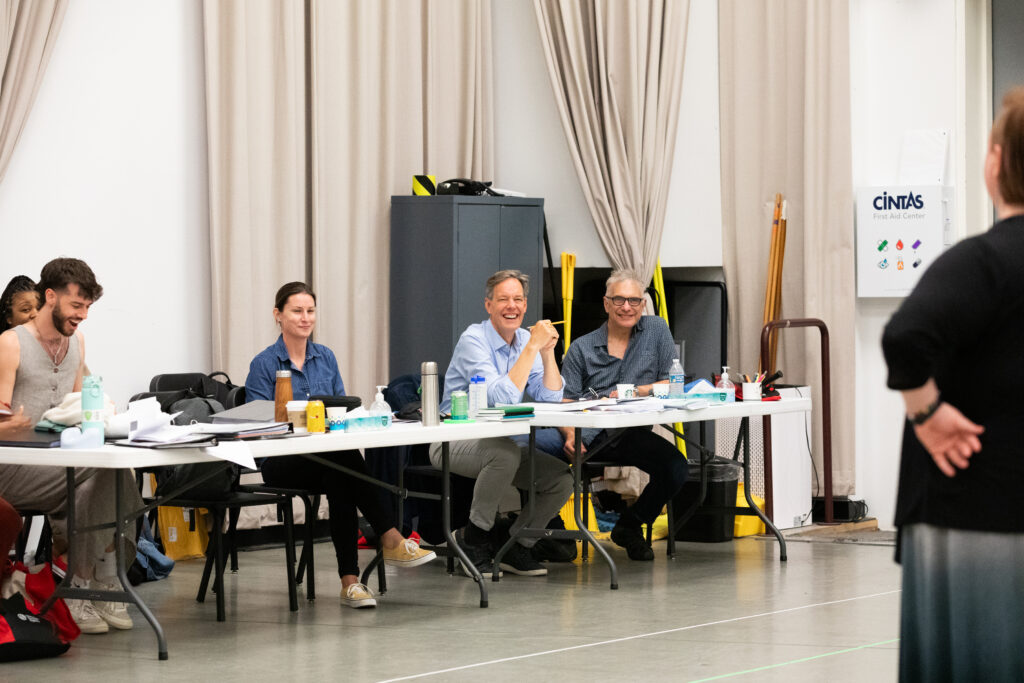 Gene Scheer (far right) and Jake Heggie during an Intelligence rehearsal. (Photo by Lawrence Knox)