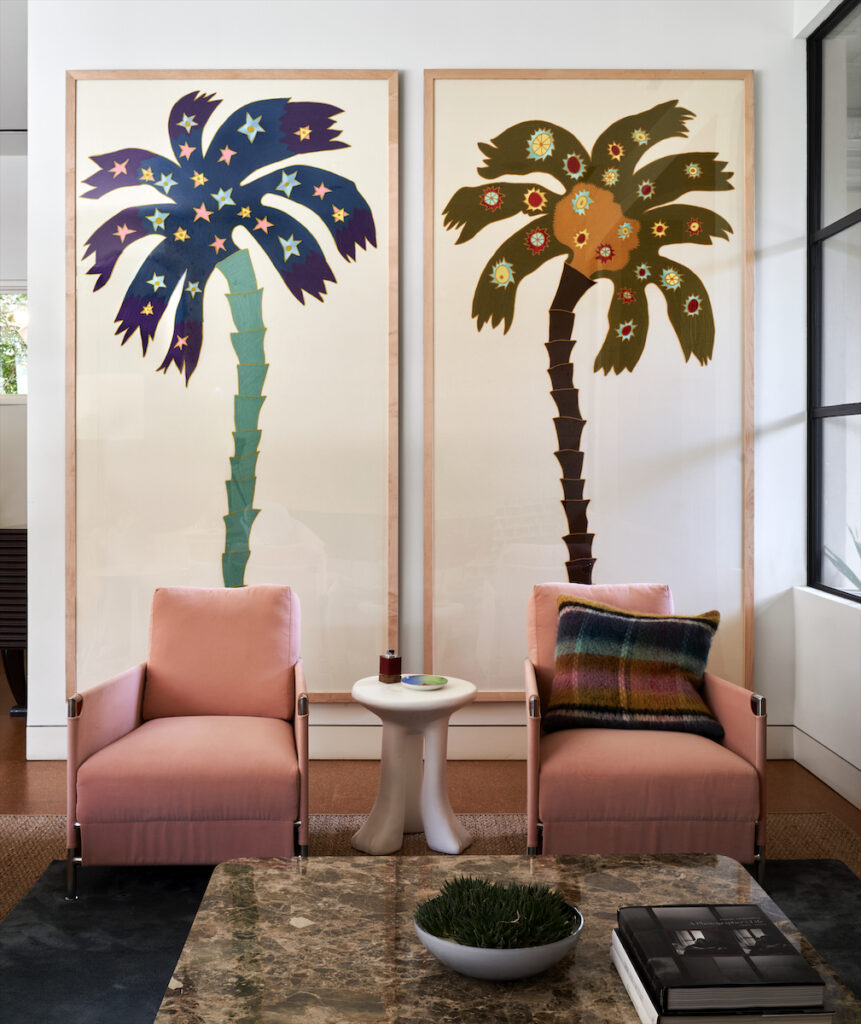 In the salon, a pair of framed custom designed fabric panels by Pierre Frey. Chairs and plaster John Dickinson side table from David Sutherland Showroom. (Photo by Pär Bengtsson)