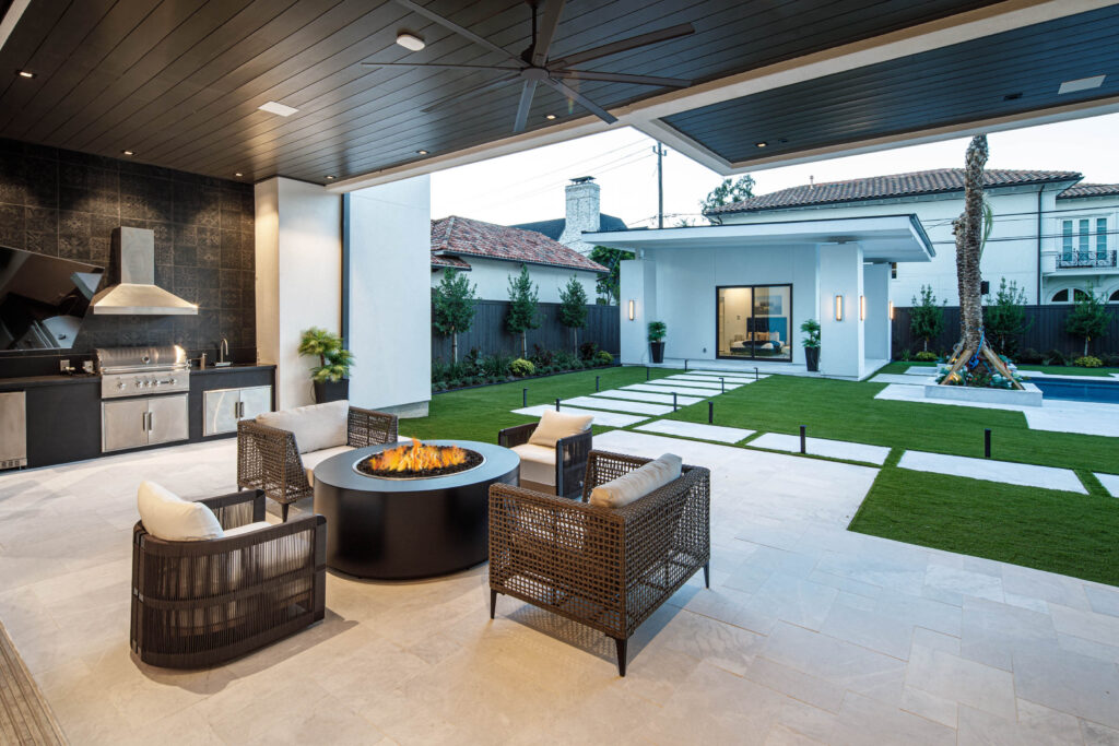 The perfect outdoor loggia to enjoy and bask in the glow of the fire pit. (Photo by Steve Chenn)