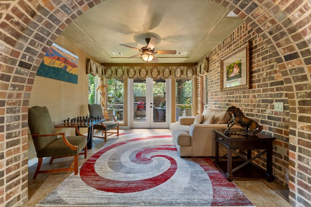 One of the many spaces to enjoy is the sun room, perfect for quiet moments or a game of chess.