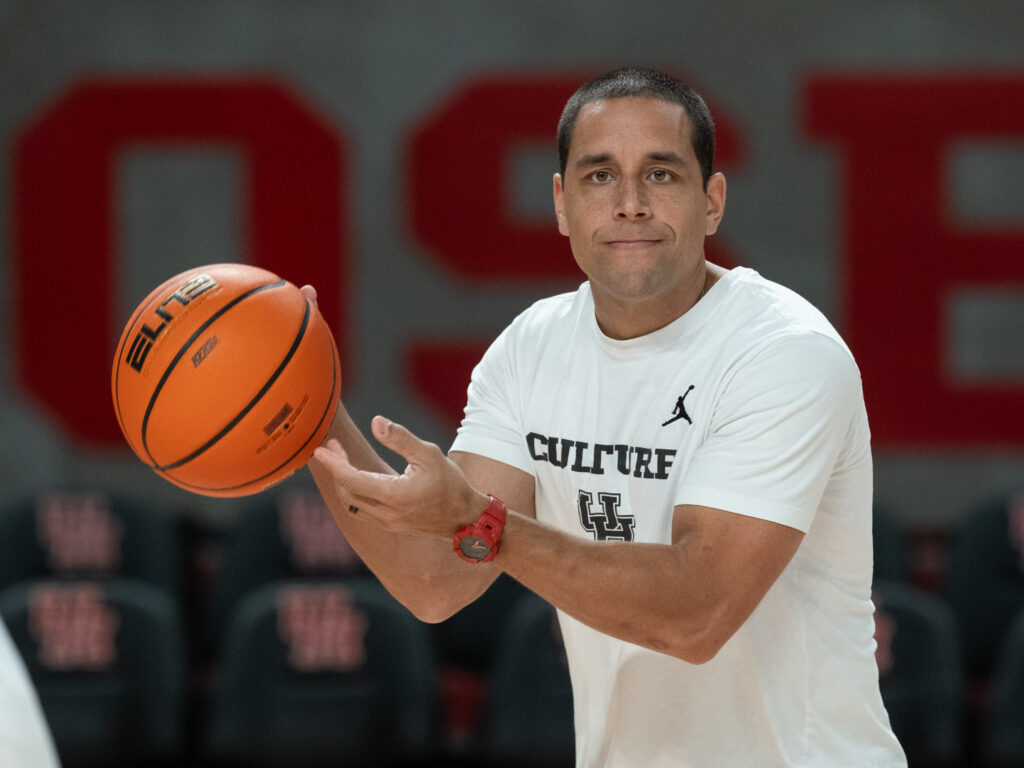 UH assistant coach Kellen Sampson knows that his dad has always been The Weather. (Photo by F. Carter Smith)