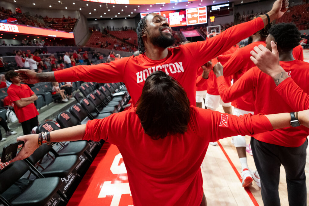 University of Houston forward J'Wan Roberts and do-everything director of basketball operations Lauren Sampson know when there's reason to celebrate. (Photo by F. Carter Smith)
