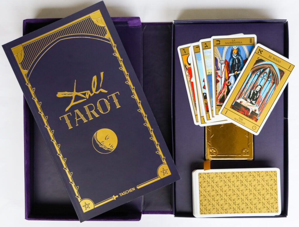 These Salvador Dalí tarot cards by Taschen are part of a re-released which first appeared in 1984. Dalí originally designed the set for the James Bond movie "Live and Let Die" (1973), but the set never made it into the film. $60.(Courtesy The Menil Collection Bookstore)