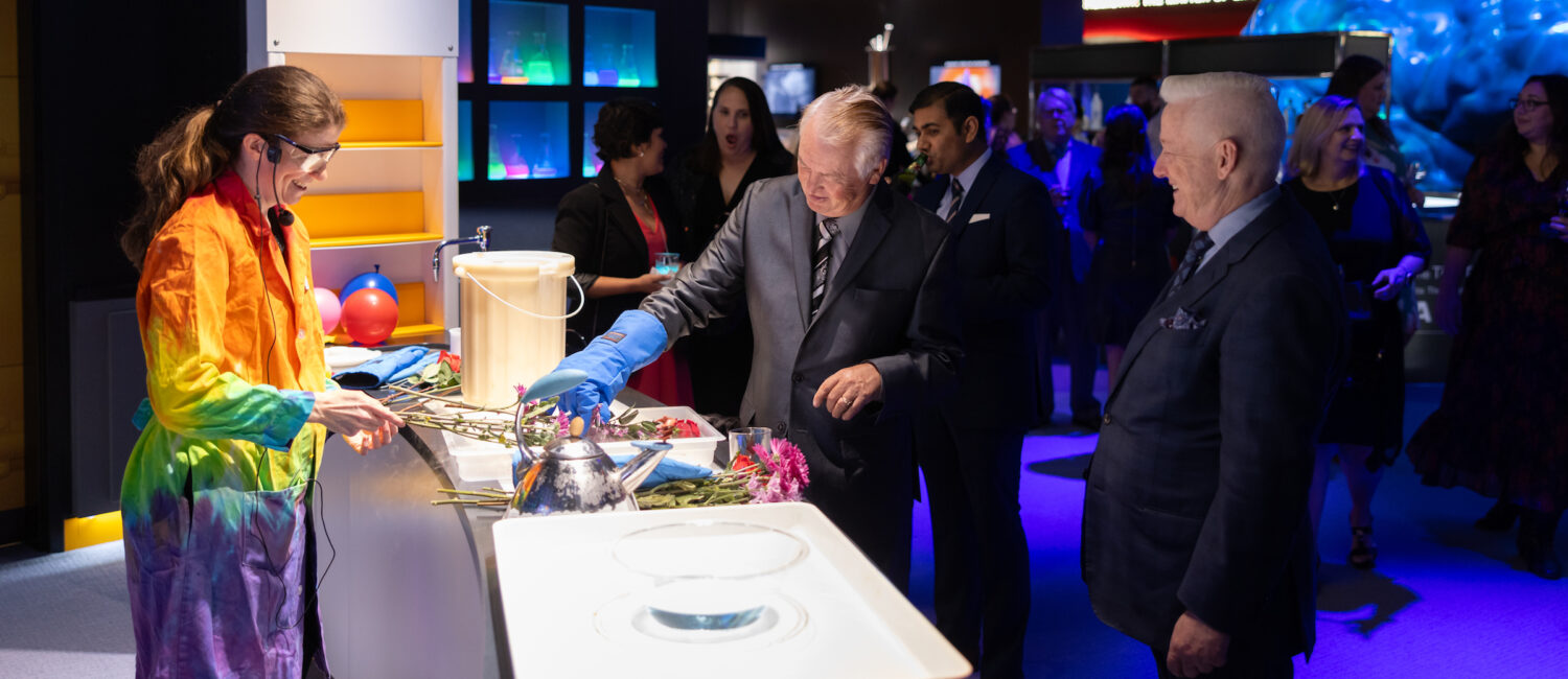 People are intrigued by experiments under way at the HMNS Welch Hall Demonstration Lab presented by Shell USA Inc. (Photo by Mike Rathke, HMNS Photographer)