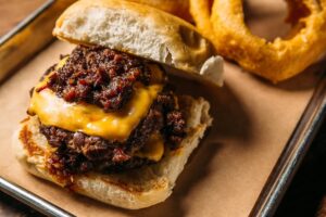Heim – Behold the Heim burger topped with burnt bacon ends jam.
