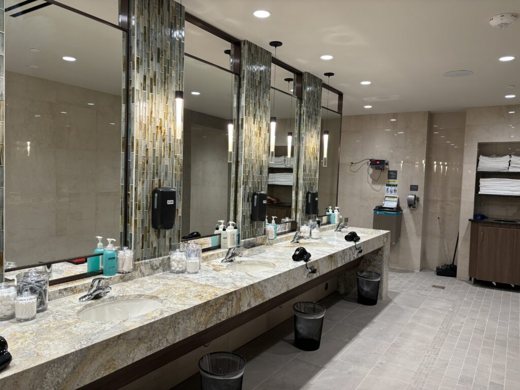 The women's locker room area has every amenity - hair dryers, private shower areas, and shower products are available.