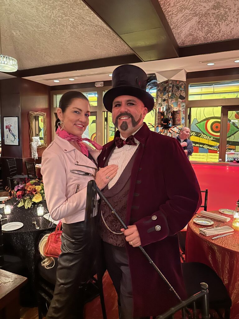 Jessica Rossman, Dr. Roland Maldonado among the costumed revelers at the La Griglia Halloween bash. (Photo by Shelby Hodge)