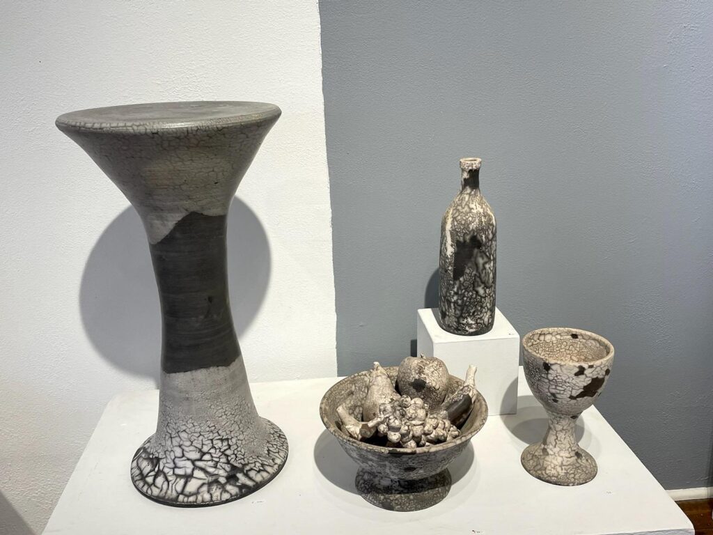 These pottery pieces created by John Foelber and Judy Adams were inspired by Belgian surrealist René Magritte. (Courtesy Foelber Pottery Gallery and Studios)