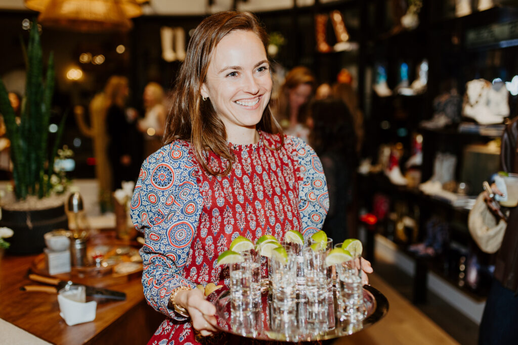 Miron Crosby's Sarah Means is hostess with the mostess at the opening of the luxury bootmakers Houston boutique. (Photo by Emma Umana)