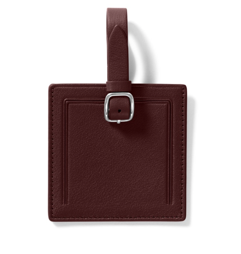 Leatherology small square luggage tag in Bordeaux, $30 (with embossing for only a little bit more), available at Leatheroloy stores and leatherology.com