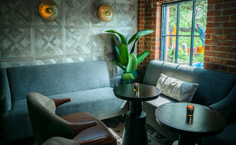 Lounge seating inside the hidden club known as La Loteria located above Paloma Suerte.