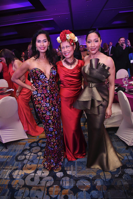 UNCF gala chairs Brandi Carson and Erica Littlejohn Burnette flank gala guest Merele Yarborough. (Photo by Vicky Pink)