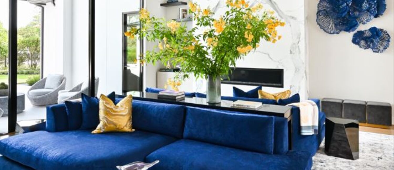 The formal living room at this Carlton Woods estate is bright and open.