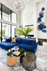 The formal living room at this Carlton Woods estate is bright and open.