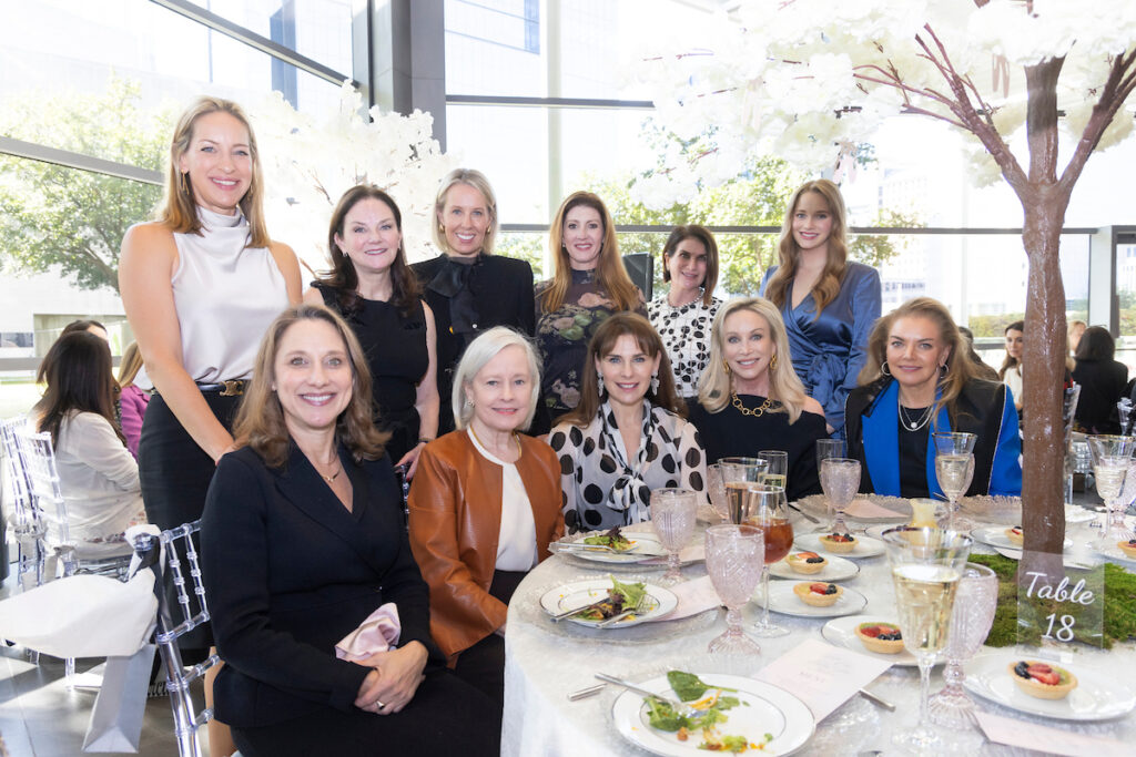 Standing from left to right: Buffy Wehner, Tiffany Jones, Courtney Love, Megan Kleinman, Linda Silver, Averie Gibbins. 
Seated from left to right: Seated, L-R: Vanessa Logan, Anne T. Bass, Nikki Webb, Kim Hext, Ashley Anderson Smith
 (Photo by Sharon Ellman)