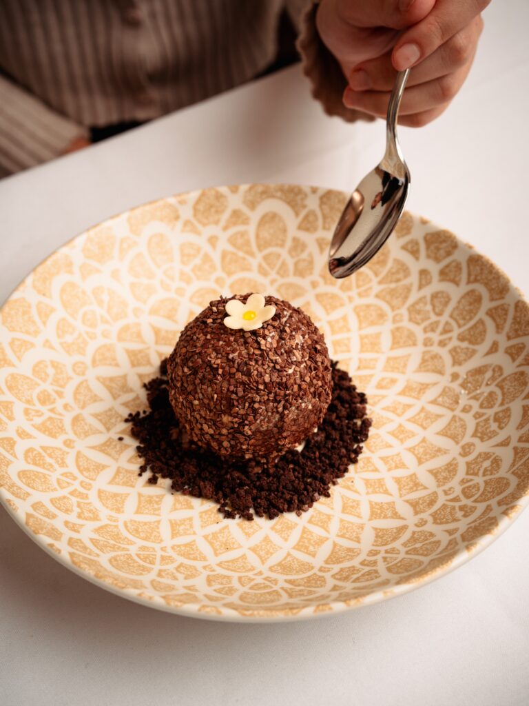 You can end things on a sweet note a Tavola with tartufo nero ($14), a chilly orb of vanilla and dark chocolate ice creams combined with a liquid chocolate center and rolled-in chocolate sprinkles.