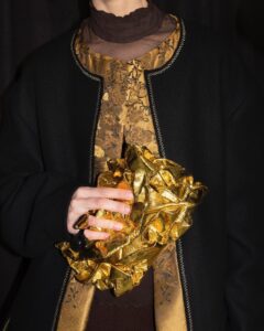 Bags – Dries Van Noten ‘s golden ruffled clutch.