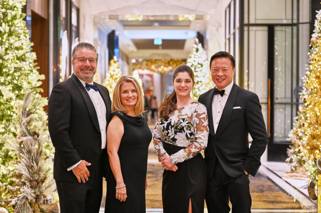 Bruce & Laura Miller, Valerie & Nick Tran at the Spindletop Holiday Ball  (Photo by PWL Studios/Fulton Davenport)