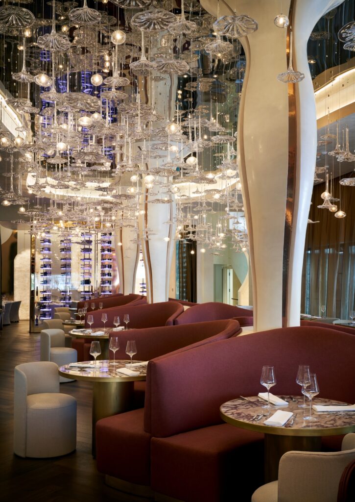 Designer Nina Magon allows that it took three workers three full days to install the Visio crystal chandelier in the Cocody dining room. (Photo courtesy of Nina Magon Studio))