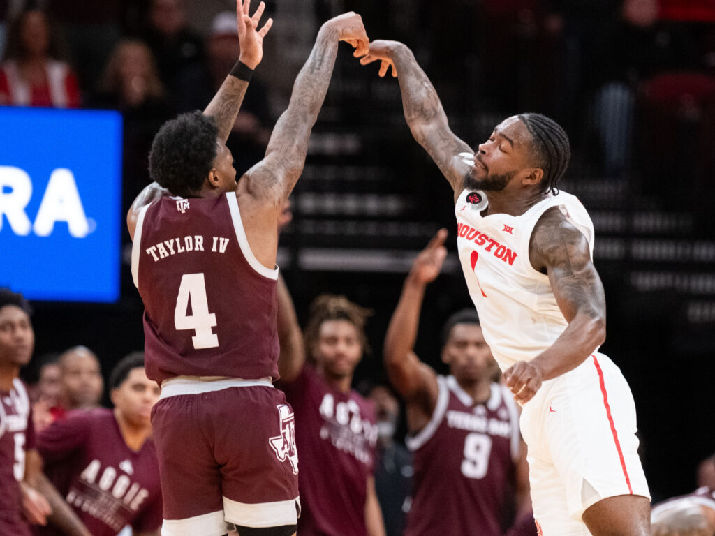 Texas A&M guard Wade Taylor IV did plenty of his damage with Jamal Shead, one of the best defenders in college basketball, right there in a regular season meeting. (Photo by F. Carter Smith)