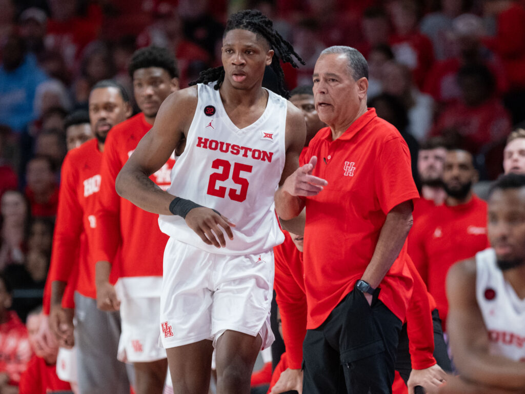 University of Houston forward JoJo Tugler and Kelvin Sampson have a 
 tight bond. (Photo by F. Carter Smith)