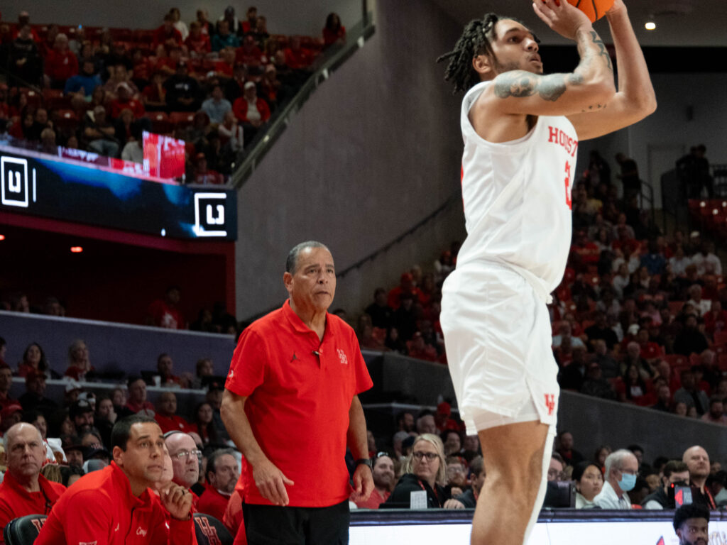 University of Houston head coach Kelvin Sampson watches Emanuel Sharp line up a 3-pointer. (Photo by F. Carter Smith)
