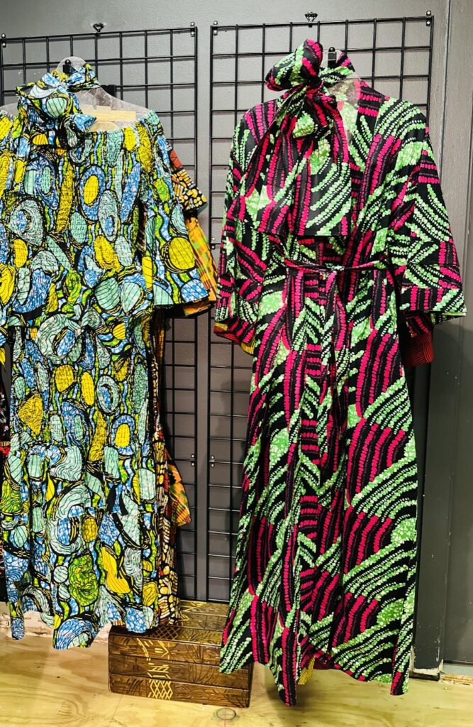 This colorful women's African 2 piece set and kimono jacket with headwrap were designed using African Wax Print or Ankara fabric. $60-75. (Courtesy Houston Museum of African American Culture Gift Shop)