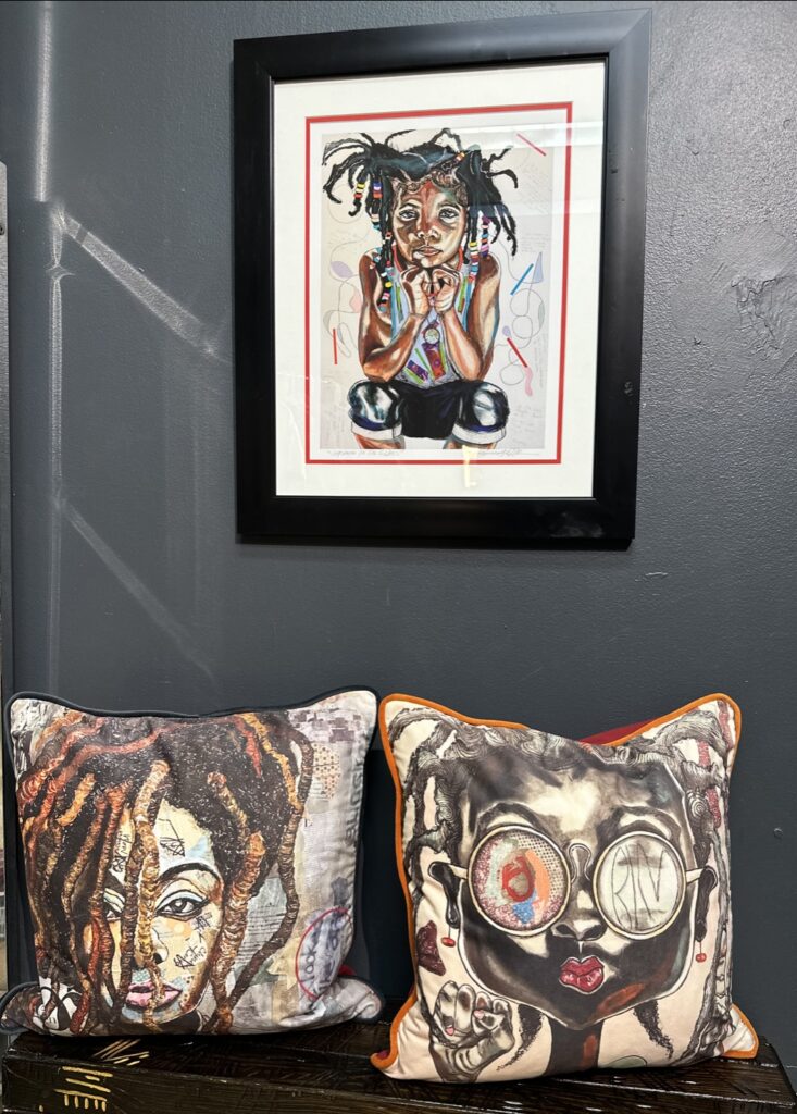 This Romeo Clay Robinson print and custom pillows will brighten up any room. Robinson is a Houston-based artist whose work has appeared at the Bisong Gallery. $150-200. (Courtesy Houston Museum of African American Culture Gift Shop)
