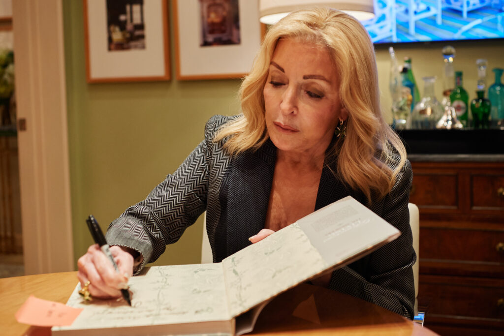 Jan Showers signs her book at Jan Showers