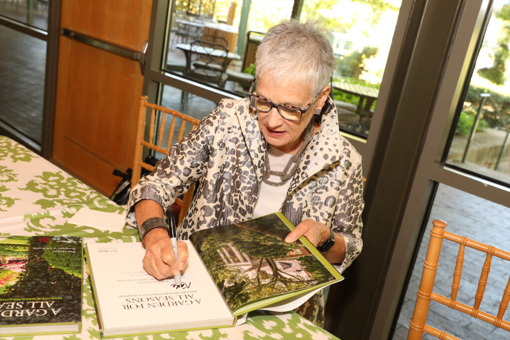 Kate Markert, Executive Director of the Hillwood Estate, Museum and Gardens signing her book "A Garden for All Seasons" (Photo by Rob Wythe)