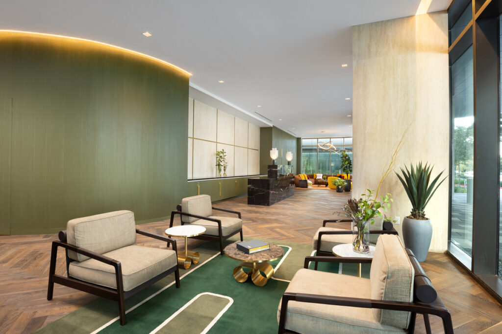 Kathy armchairs in the lobby of Residences at The Allen. Decor by BeDesign.  (Photo by Shannon O’Hara Photography)
