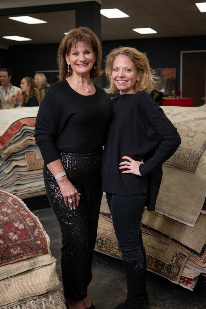 Beth Dow, Julie Sacco at the Turkish Rug Company showroom grand opening party benefiting the Salvation Army.