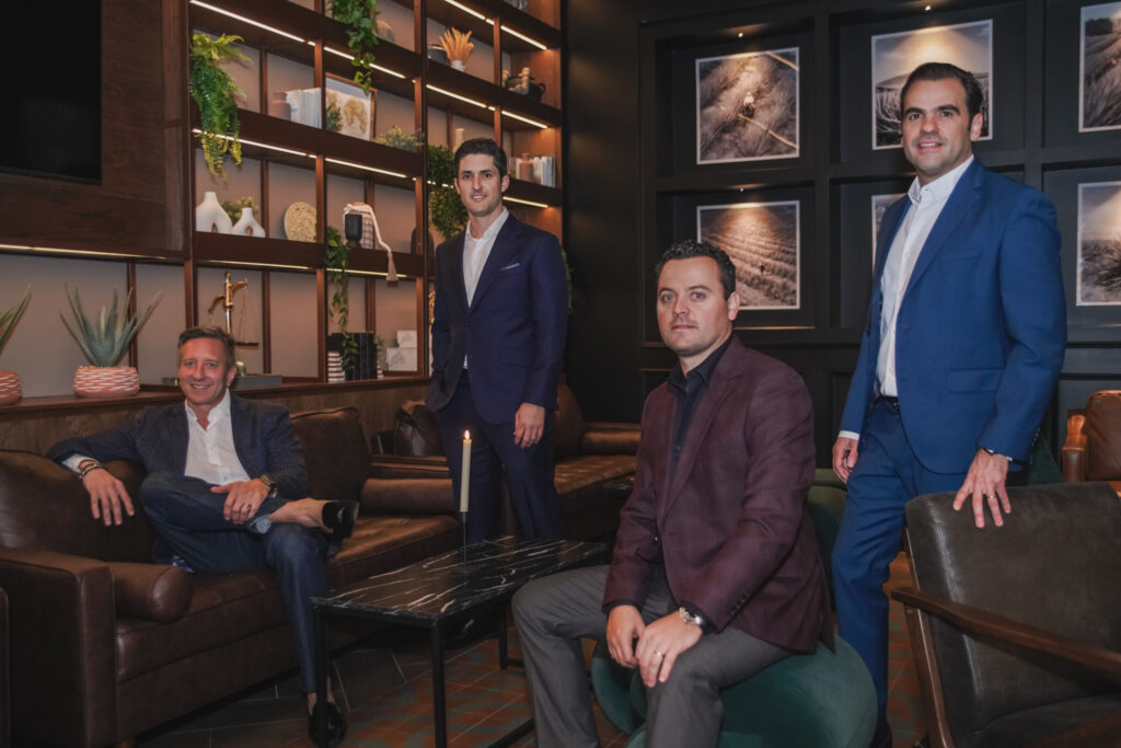 The speakeasy hidden behind Monarco's main dining room has comfortable seating for people to linger after a meal. Co-owners Alex Urrunaga, Marcelo Sada, Pablo Najera and Mauricio Guerra hope the late closing time of 2 am is a hit. (Photo by Mario Santos)