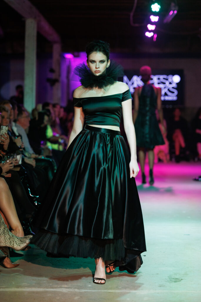 Neal Hamil model Mandy Simon on the runway at Magpies & Peacocks After Dark (Photo by Jay Marroquin)