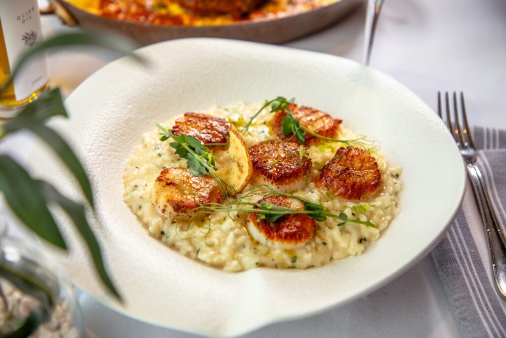 Risotto Limone Capesante ($40) with seared sea scallops, carnaroli rice, prosecco butter sauce, and lemon zest can be found at Lombardi Cucina Italiana.