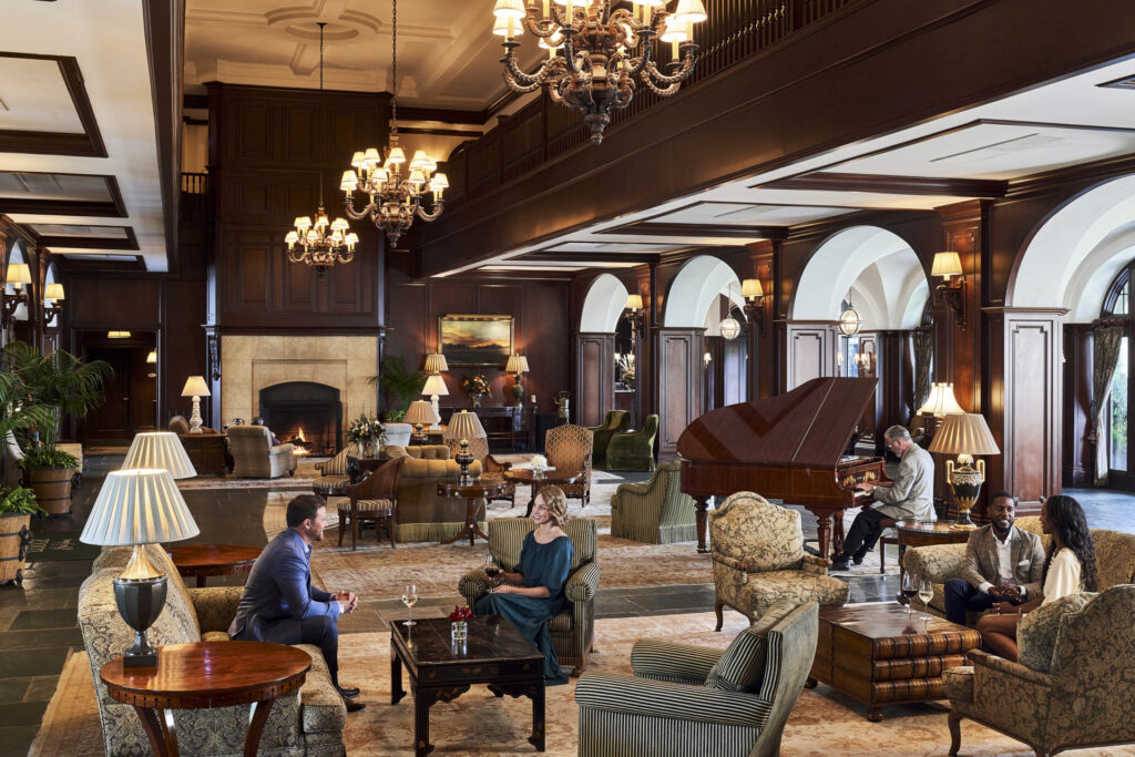 The Lodge at Sea Island is a sophisticated and cozy scene overlooking the golf course and the ocean.  (Photo courtesy of Sea Island)