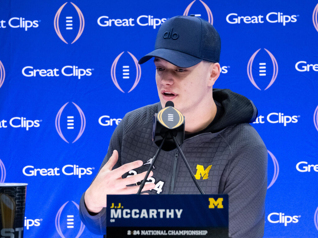 Michigan Wolverines quarterback J.J. McCarthy answers questions during Media Day at the George R. Brown Convention Center as the City of Houston hosts the NCAA College Football Championship game with the University of Washington facing off against the University of Michigan at NRG Stadium, January 8, 2024