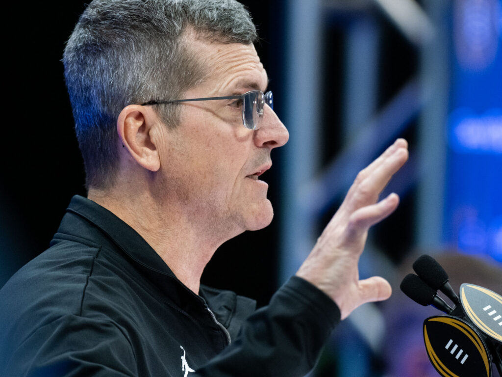 Michigan coach Jim Harbaugh has found himself at the center of controversy this season and playing for the national championship. (Photo by F. Carter Smith)