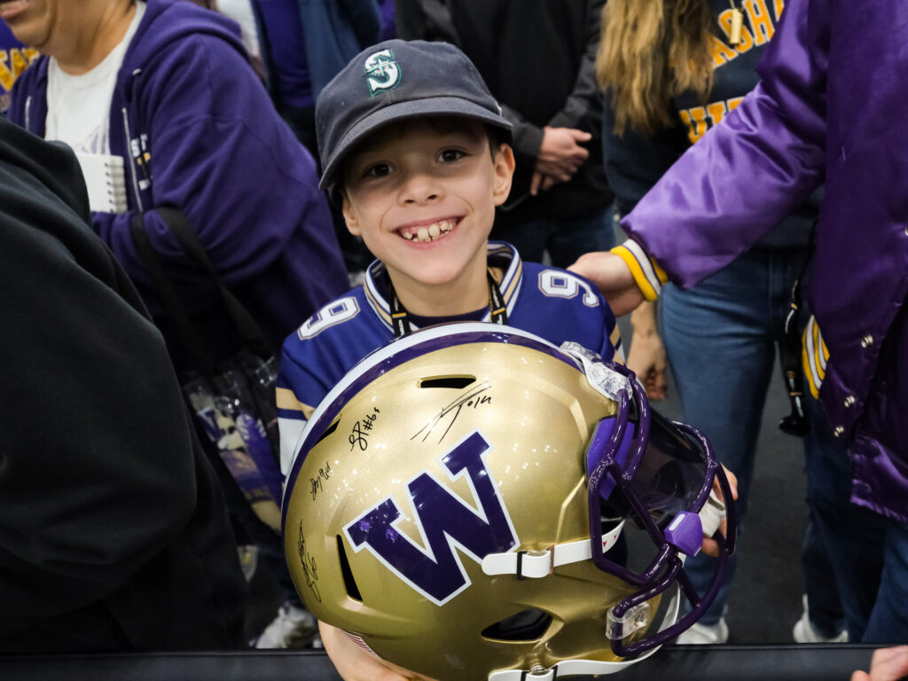 A young Washington fan is all in on this national championship moment. (Photo by F. Carter Smith)