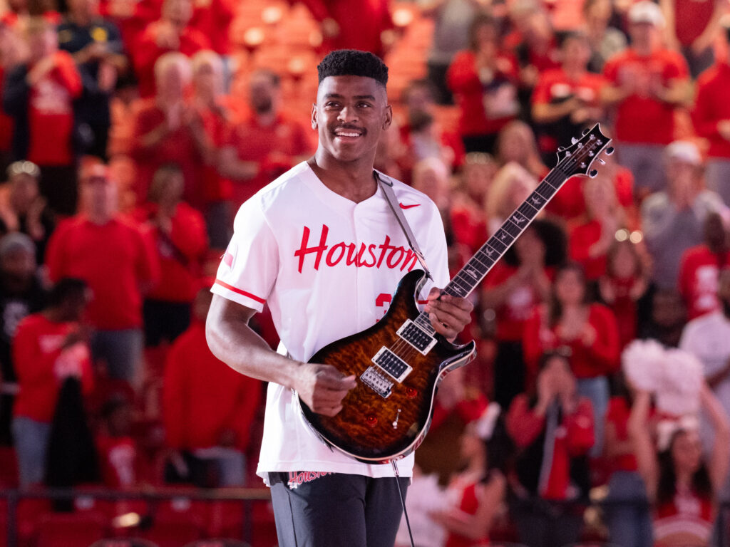 University of Houston outfielder Trae Jones did an electric National Anthem before UH basketball's Big 12 opener. (Photo by F. Carter Smith)