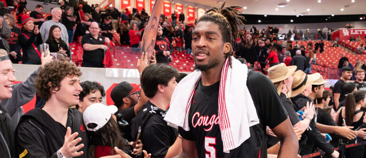 UH center Ja'Vier Francis is a man of the people, mingling with the student section. (Photo by F. Carter Smith)