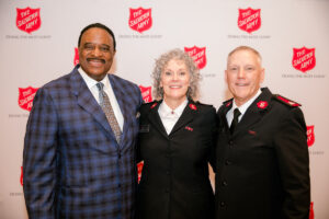 James Brown with Majors Paul and Dawn McFarland