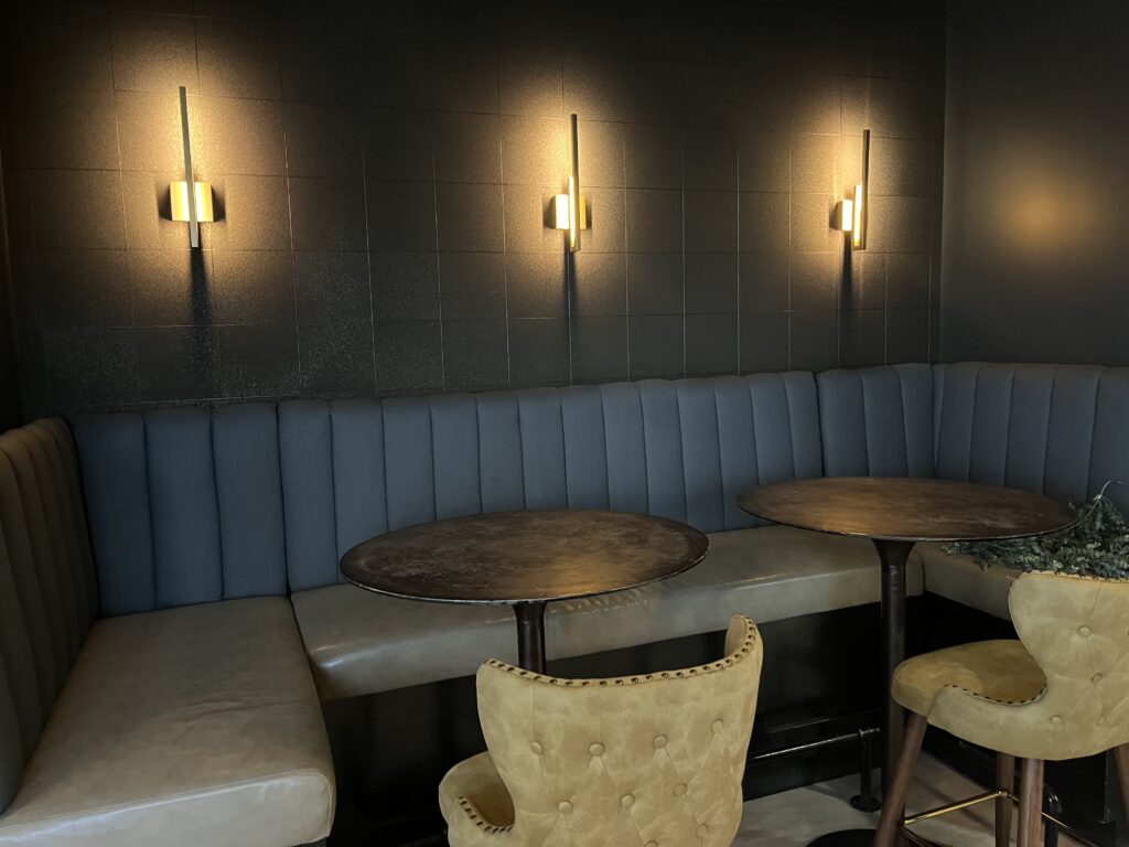 Salute Wine Bar has added new seating and comfortable touches to the self-pour concept.