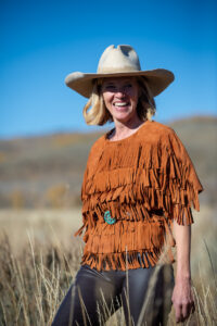 Lela Rose models a fringed suede blouse from her namesake Ranch collection. (Photo by Lela Rose Ranch)