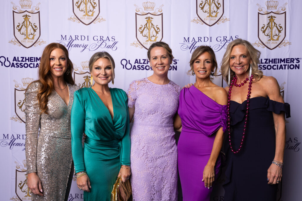 Beth Bryan, Dr. Melissa C. Bowman, Vanessa Meyer, Leslie Reilly and Susan Salinger make the scene at the Mardi Gras Memory Ball at the Conroe Hyatt Regency.