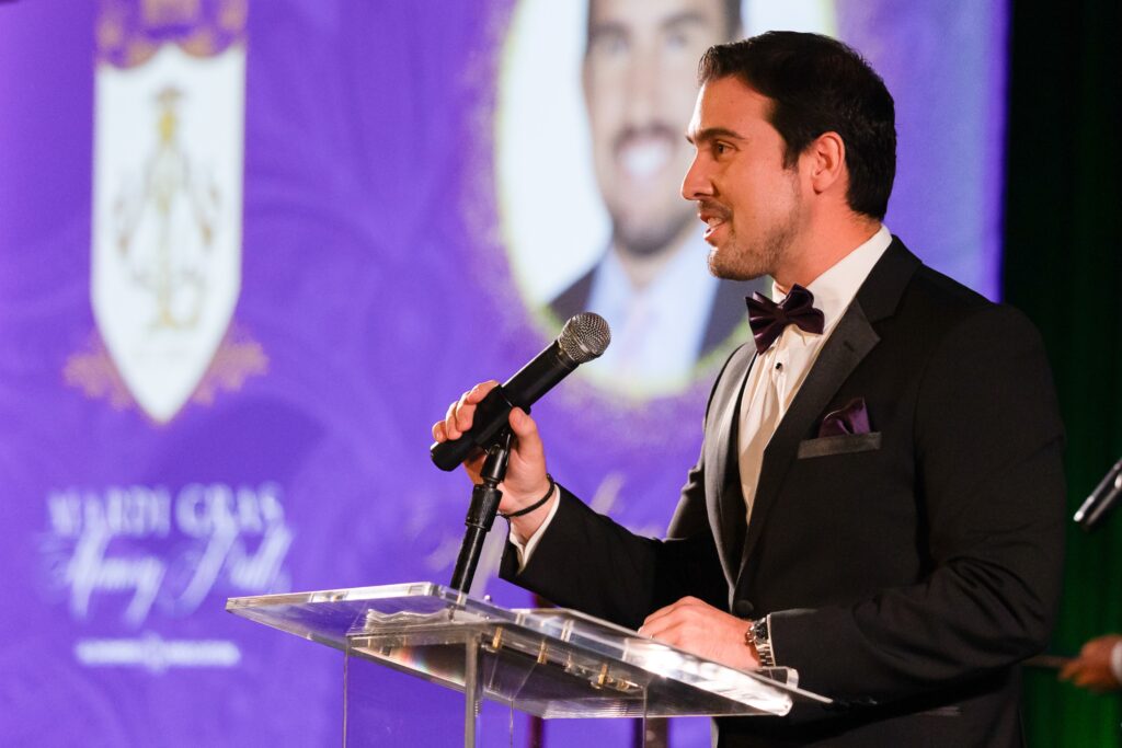 KHOU reporter Marcelino Benito emceed the Alzheimer's Association's Mardi Gras Memory Ball. Benito lost his mother to Alzheimer's disease last year. (Photo by Matthew Shetz - FOCUS Woodlands)